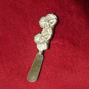 Stainless steel cherubs butter knife